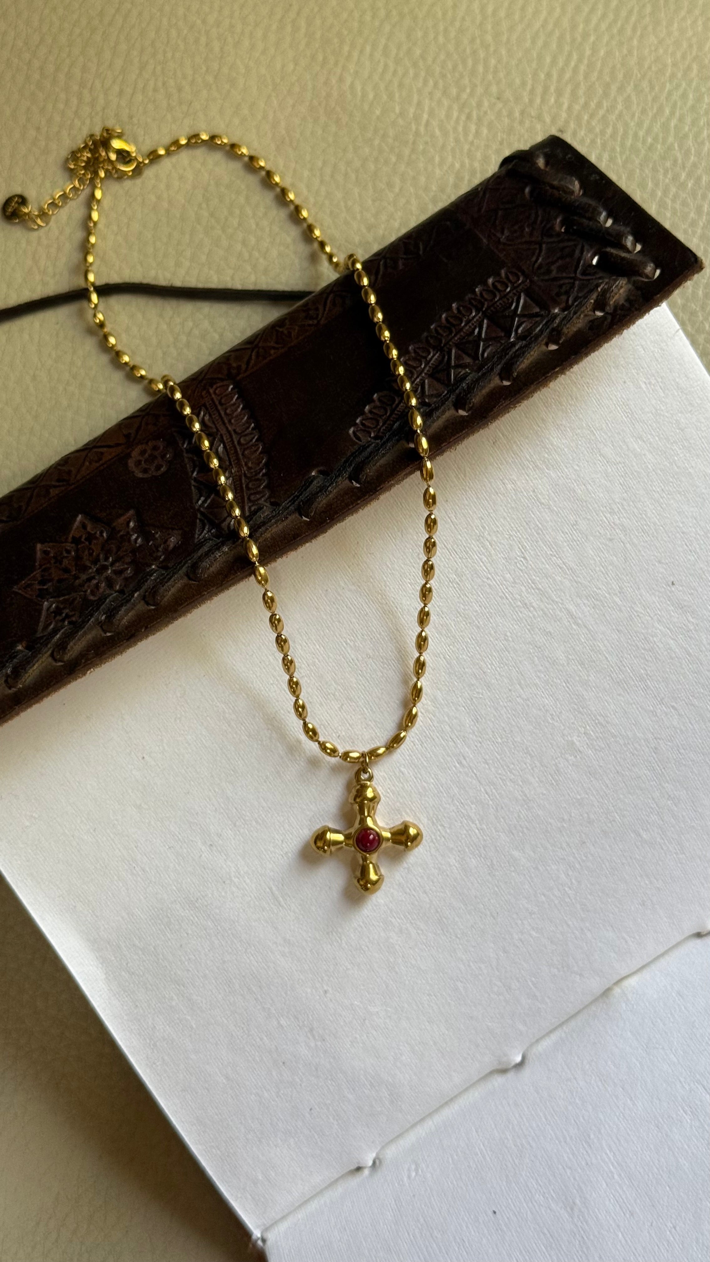 Red stone cross chain