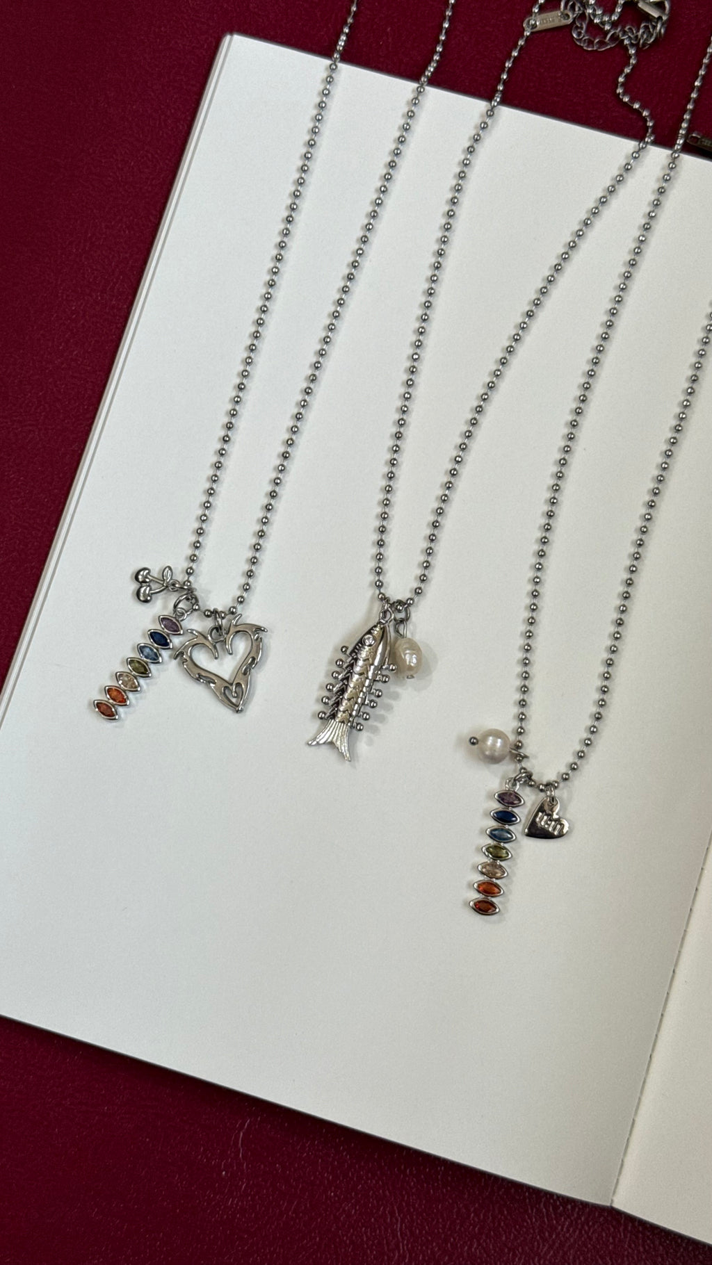 Silver multicharm chains