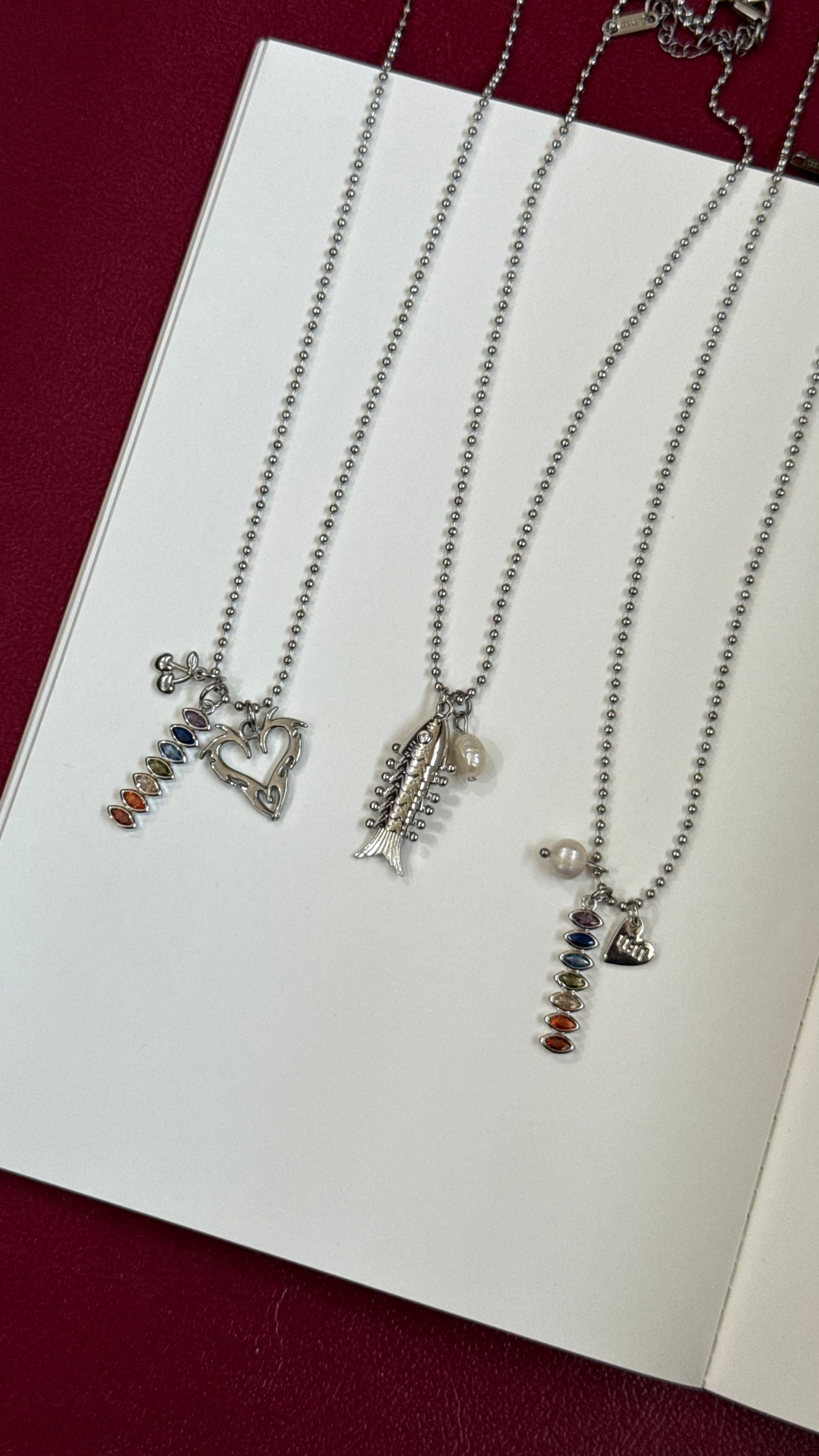 Silver multicharm chains
