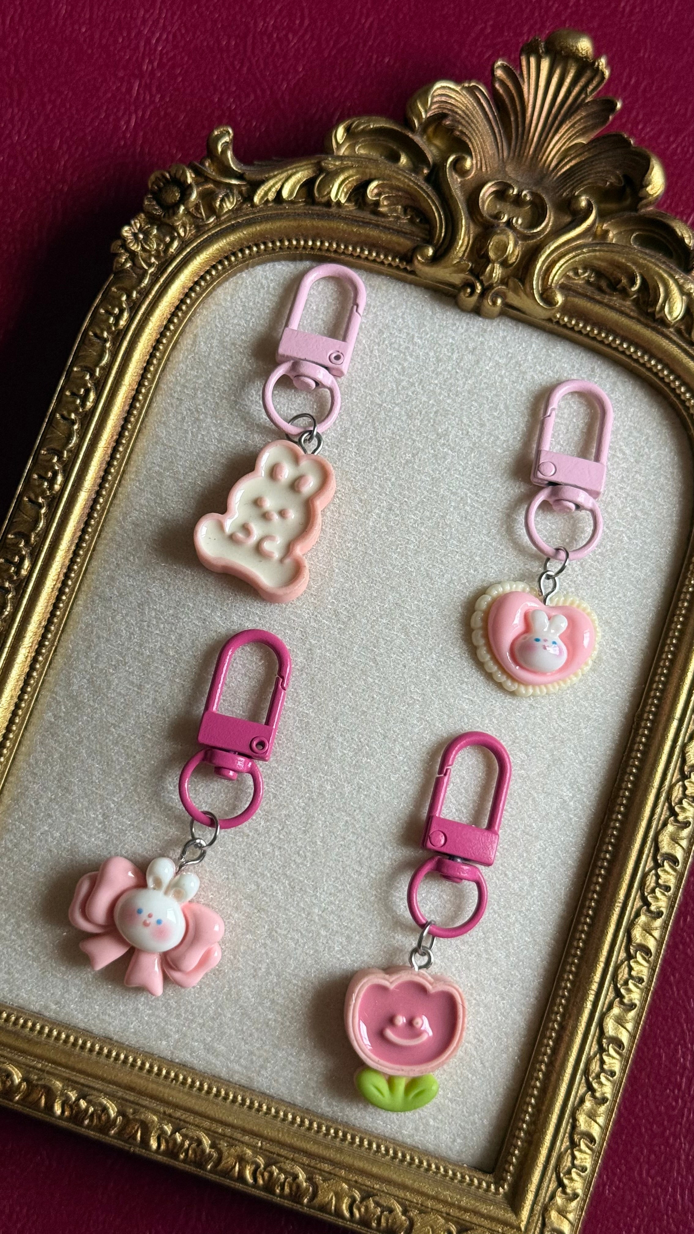 Pink figure keychains