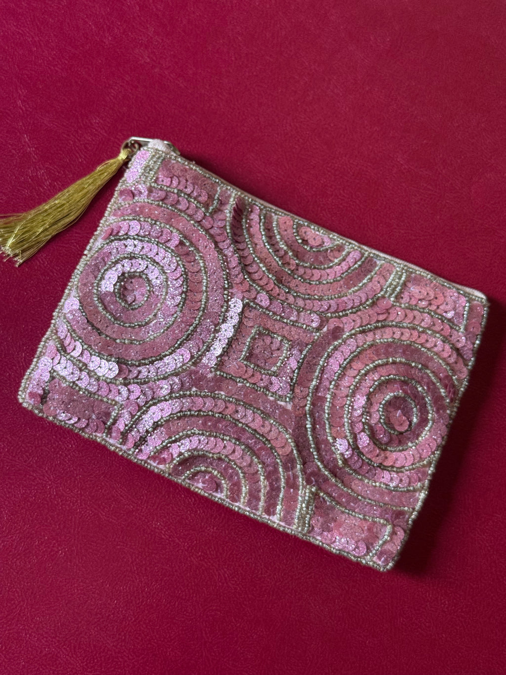 Pink embellished pouch