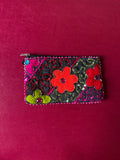 Flower embellished pouch