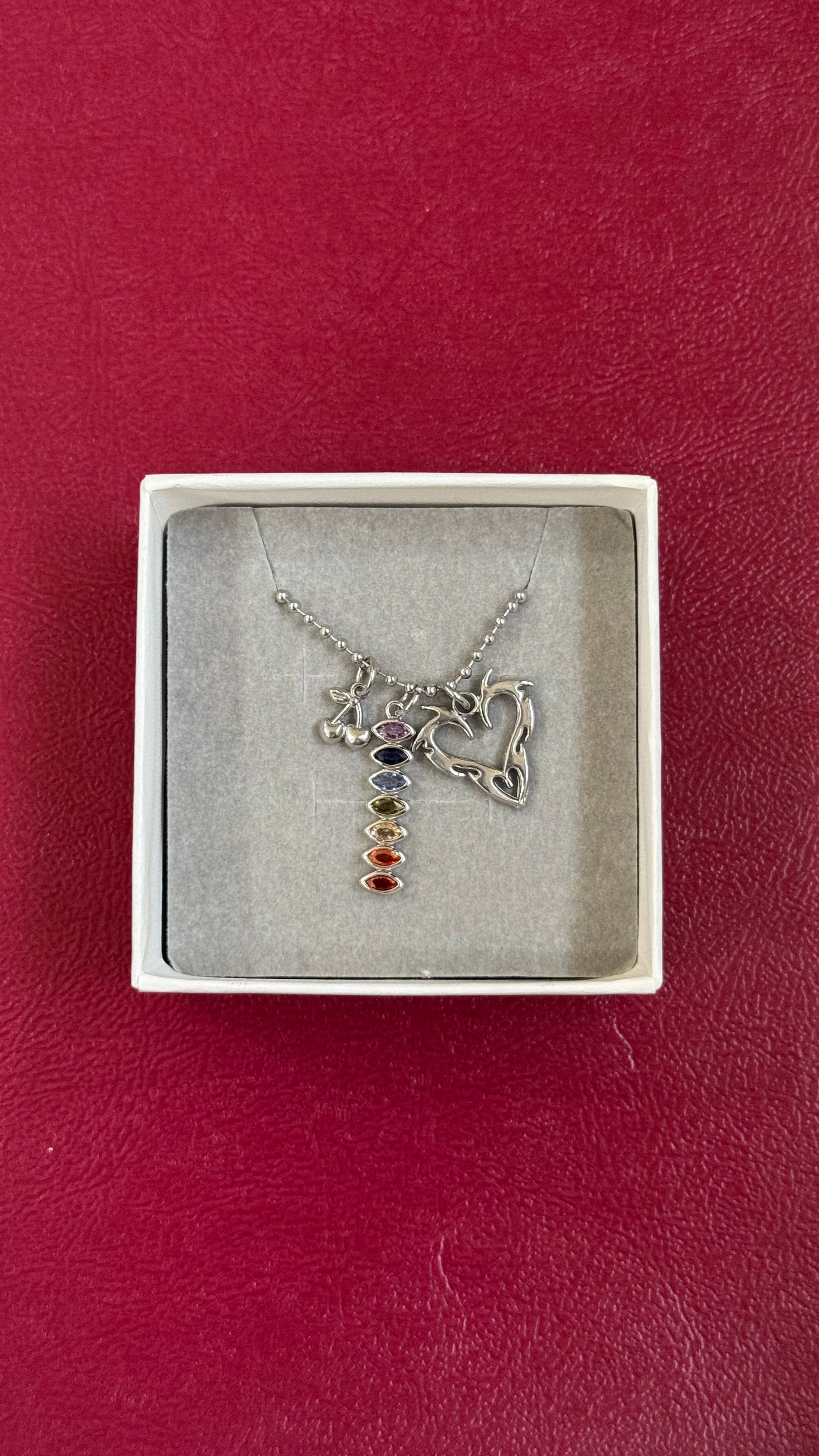 Silver multicharm chains