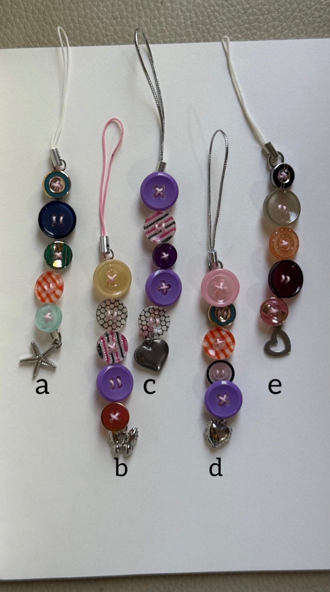Multicolor button up charm
