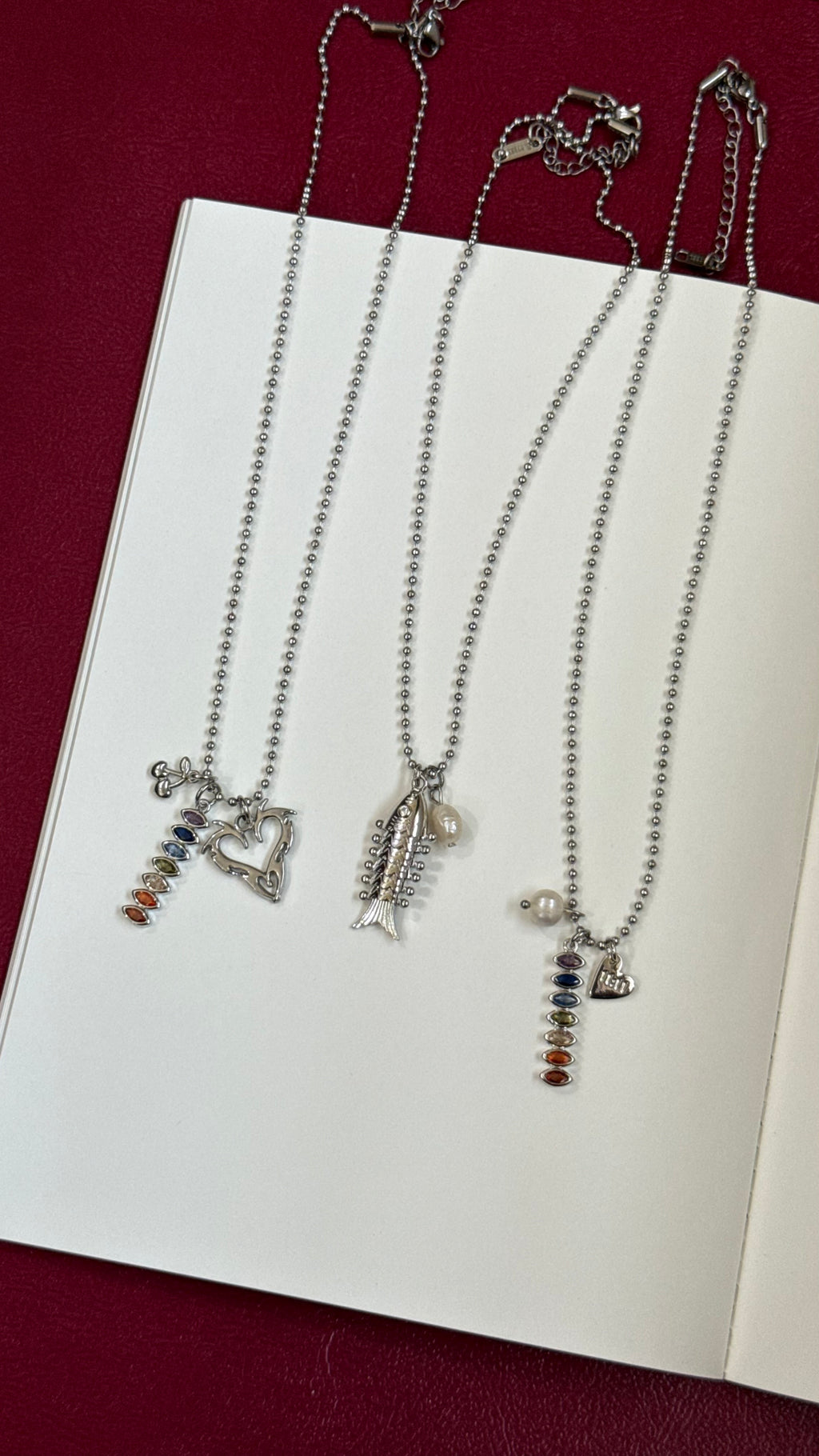 Silver multicharm chains