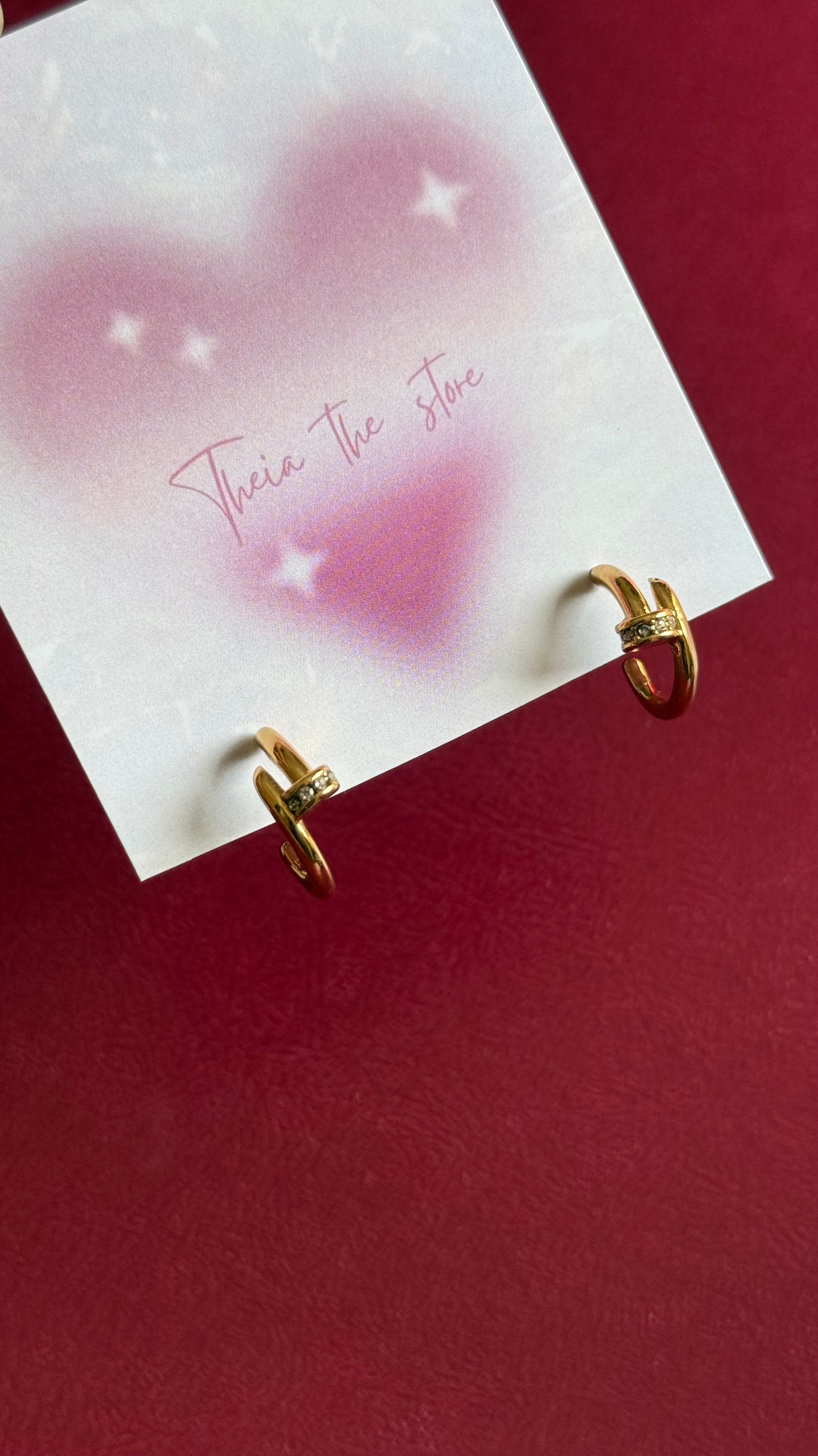 Nail earrings