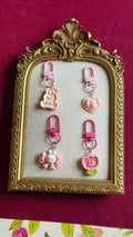 Pink figure keychains