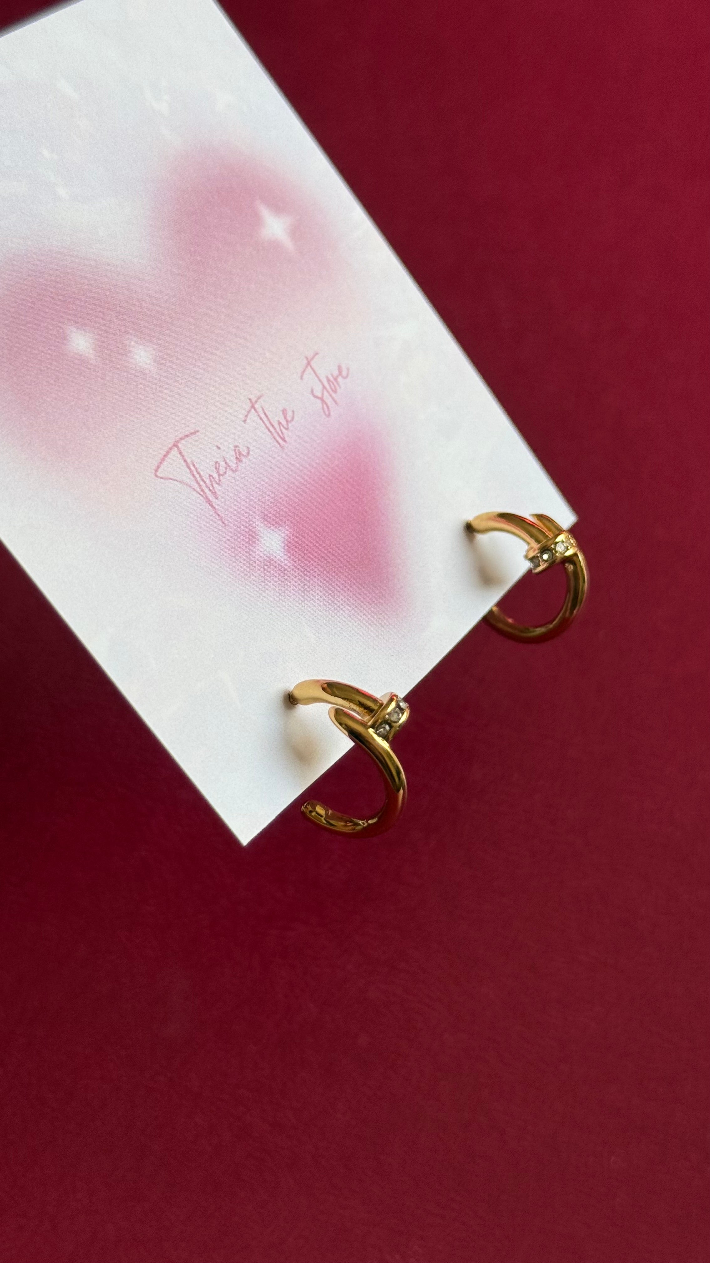 Nail earrings