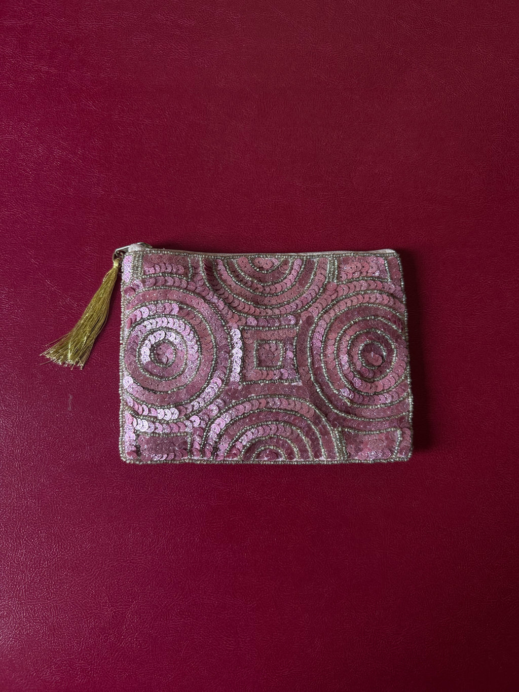 Pink embellished pouch