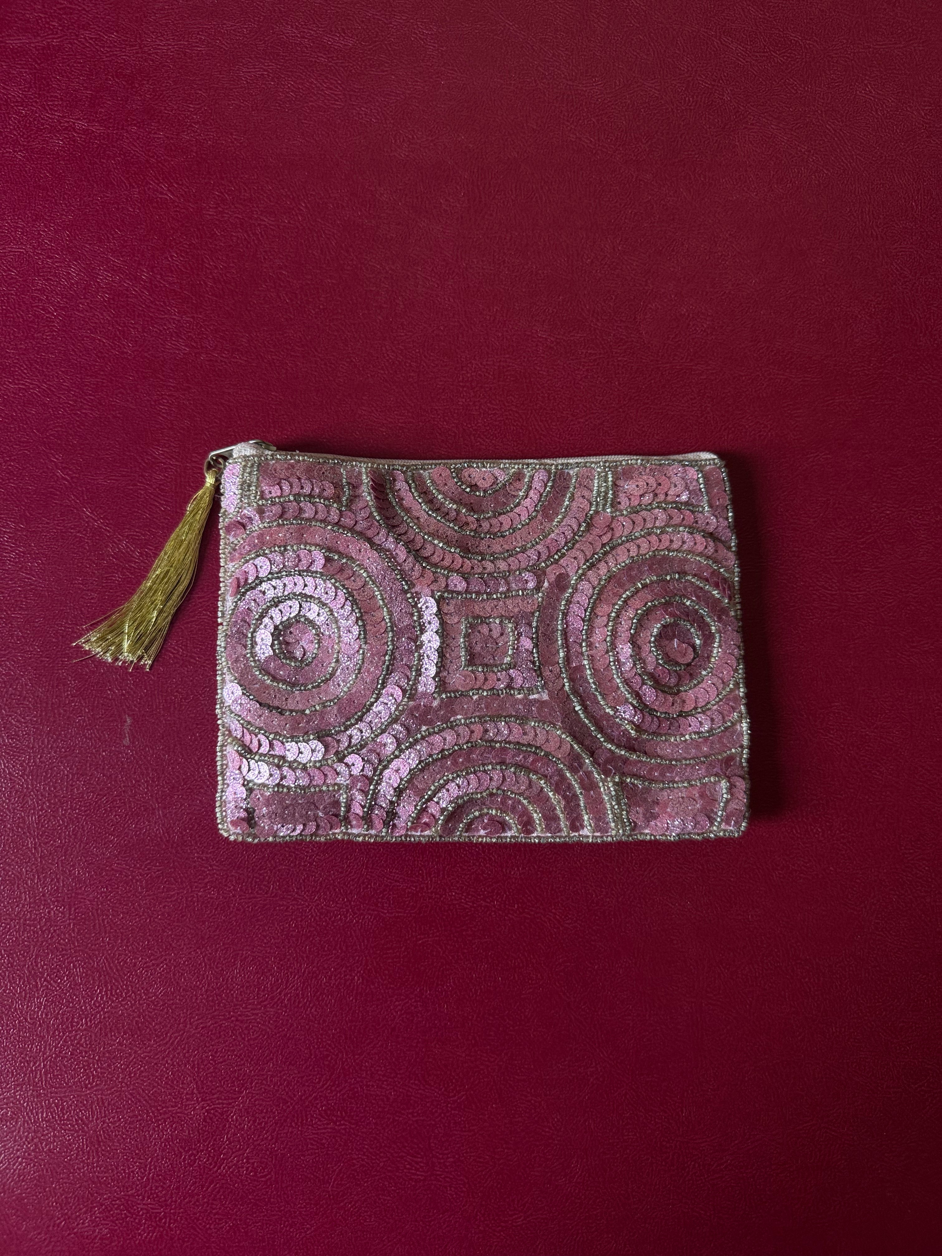 Pink embellished pouch