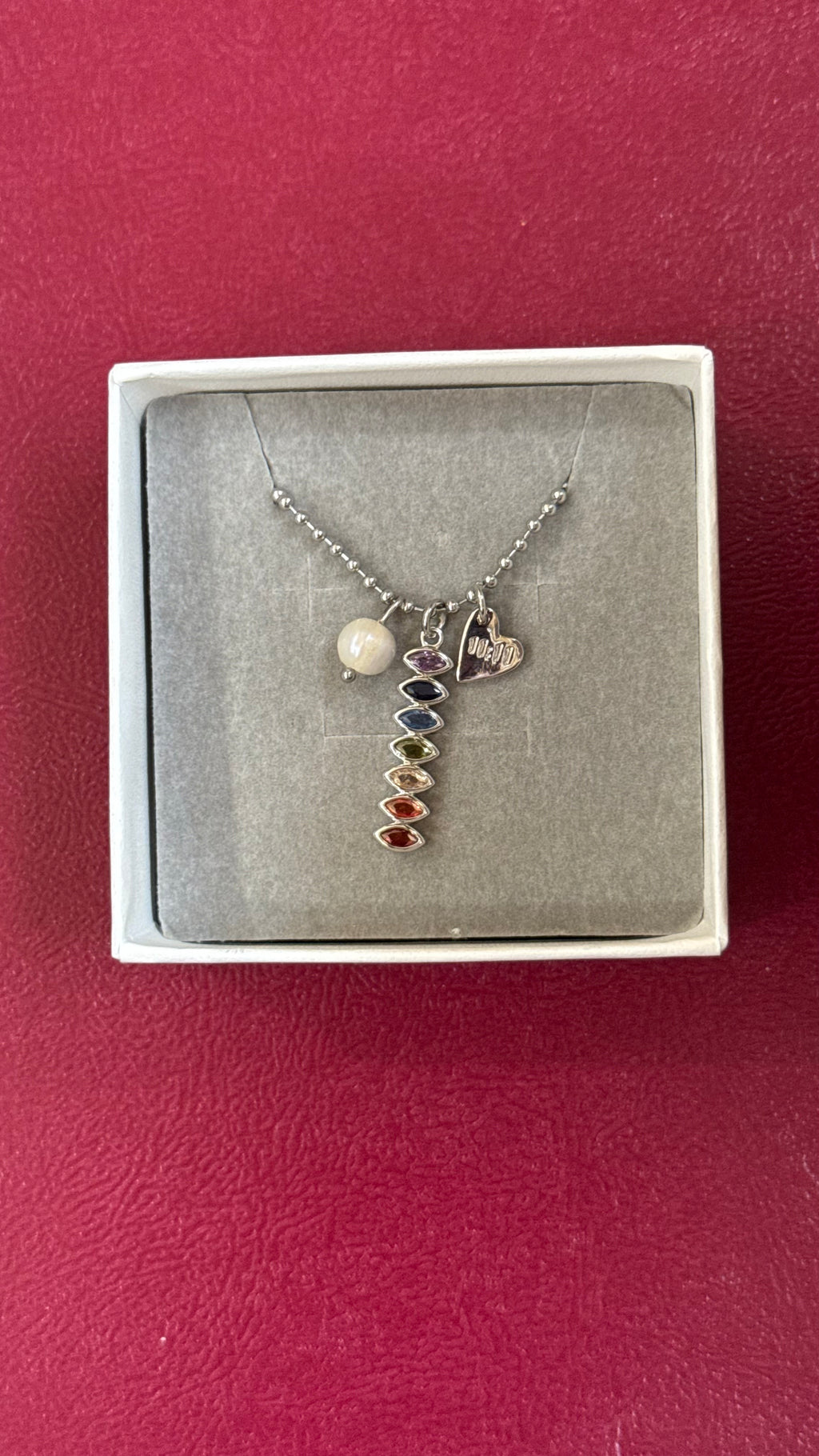 Silver multicharm chains