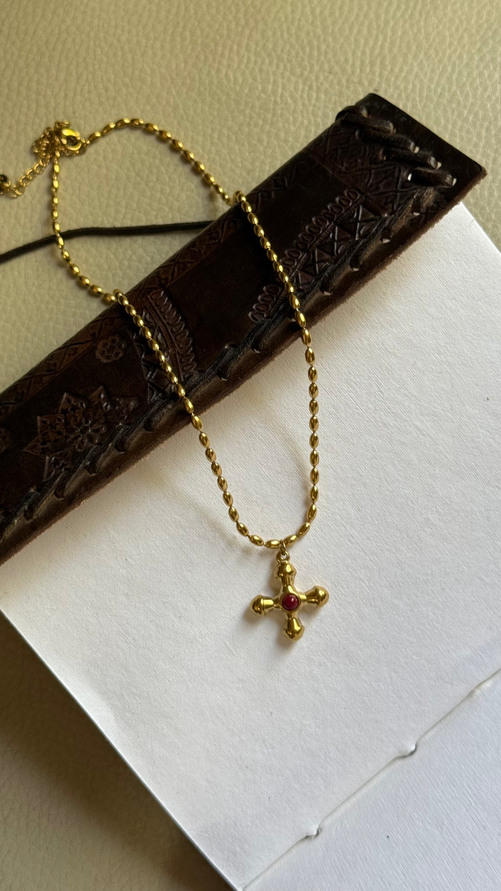 Red stone cross chain